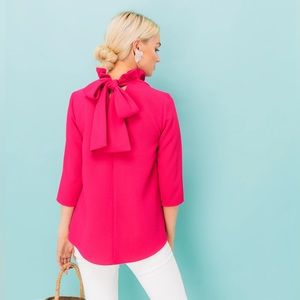 Pomander Place by Tuckernuck ruffle neck and bow tie Faye Top in fuschia. Sz L.